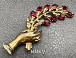 Vintage 4.25 HUGE Pot Metal Hand Holding Flowers Brooch Red Rhinestone