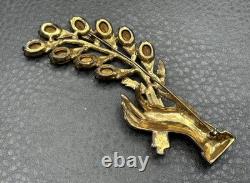 Vintage 4.25 HUGE Pot Metal Hand Holding Flowers Brooch Red Rhinestone