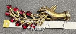 Vintage 4.25 HUGE Pot Metal Hand Holding Flowers Brooch Red Rhinestone