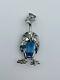 Vintage Costume Rhodium Plated Rhinestone Blue Glass Jelly Belly Brooch Pin