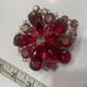 Vintage Rhinestone Brooch Red & Pink Dog Tooth Prong Set Surrounded By Round AB