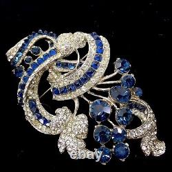 Vintage Staret rhodium plated floral spray sapphire blue crystals brooch pin