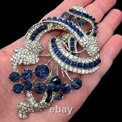 Vintage Staret rhodium plated floral spray sapphire blue crystals brooch pin