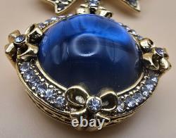 Vintage gold tone rhinestones bow dangle blue glass Cabochon designer brooch