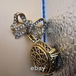 Vintage gold tone rhinestones bow dangle blue glass Cabochon designer brooch