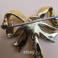 Vintage gold tone rhinestones bow dangle blue glass Cabochon designer brooch