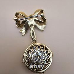 Vintage gold tone rhinestones bow dangle blue glass Cabochon designer brooch