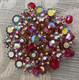 Vintage signed Weiss AB brooch en tremblant 10 moving crystals